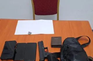 Toy gun, ski mask found after Venezuelan held