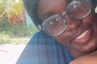 Woman in shallow grave died of asphyxia, severe spinal injuries