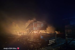 Man alerts sleeping women to approaching fire at Corriverton 