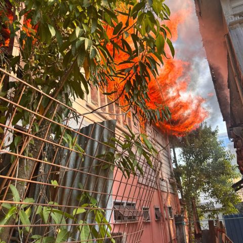Fire spreads to four buildings at Cummings Street and North Road